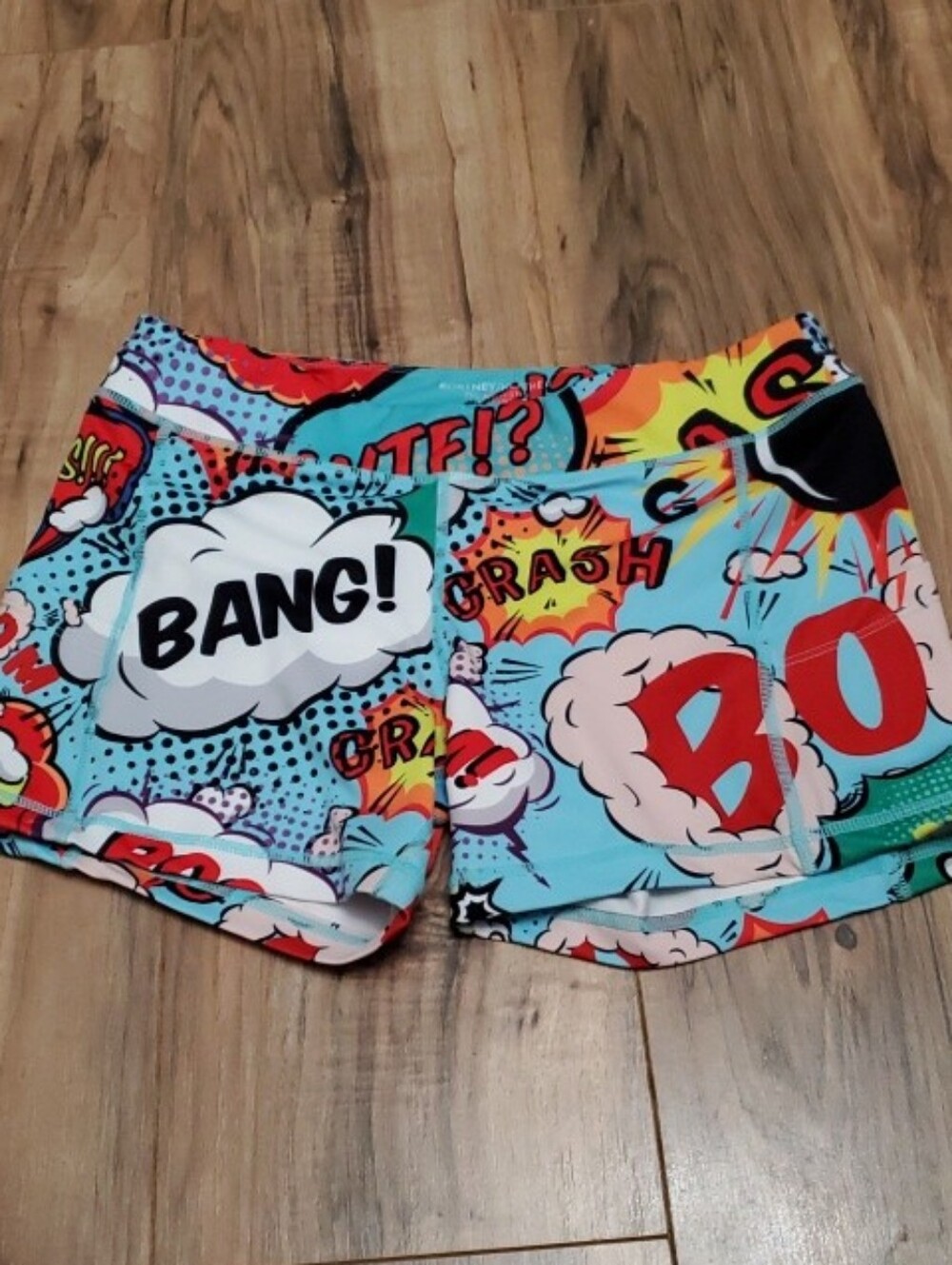 Kortney Heather Comic Pop Workout Shorts. Bottoms - Turquoise Multicolor